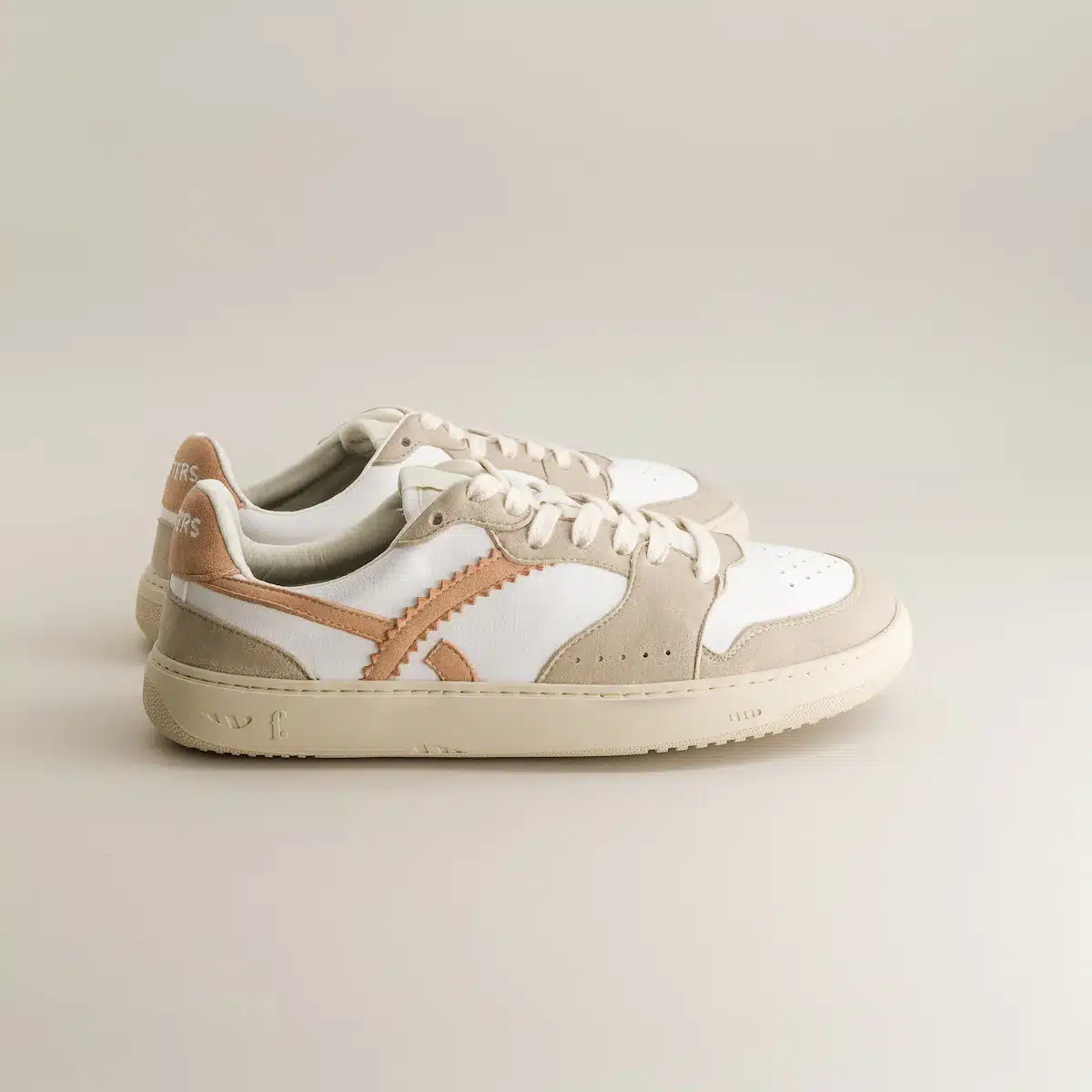 Fleeters Mango Pink barefoot sneakers side view showing flexible sole and GrapeSkin leather upper