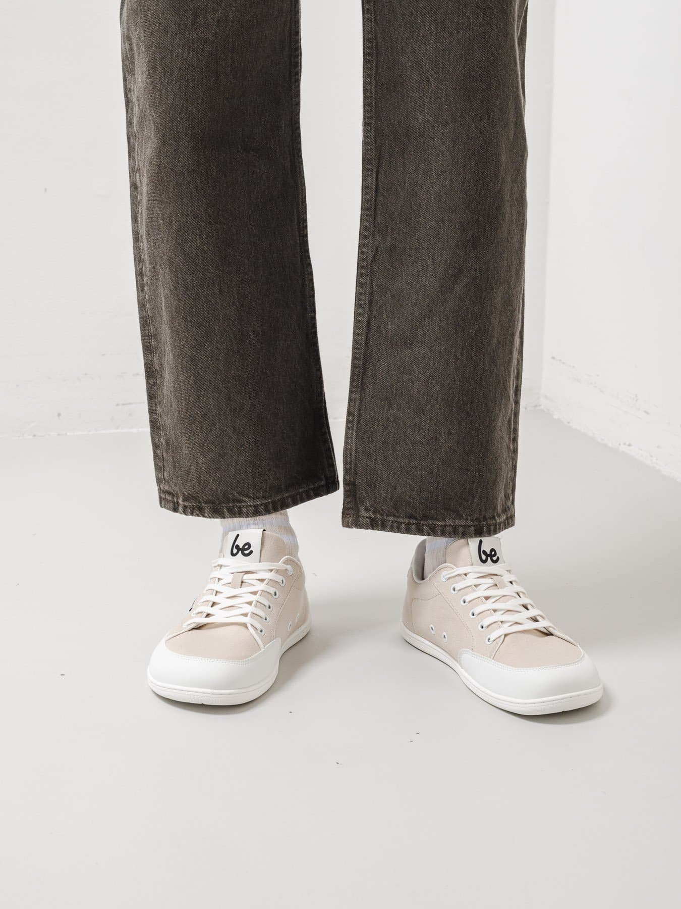 Casual everyday walking in comfortable beige barefoot lifestyle sneakers